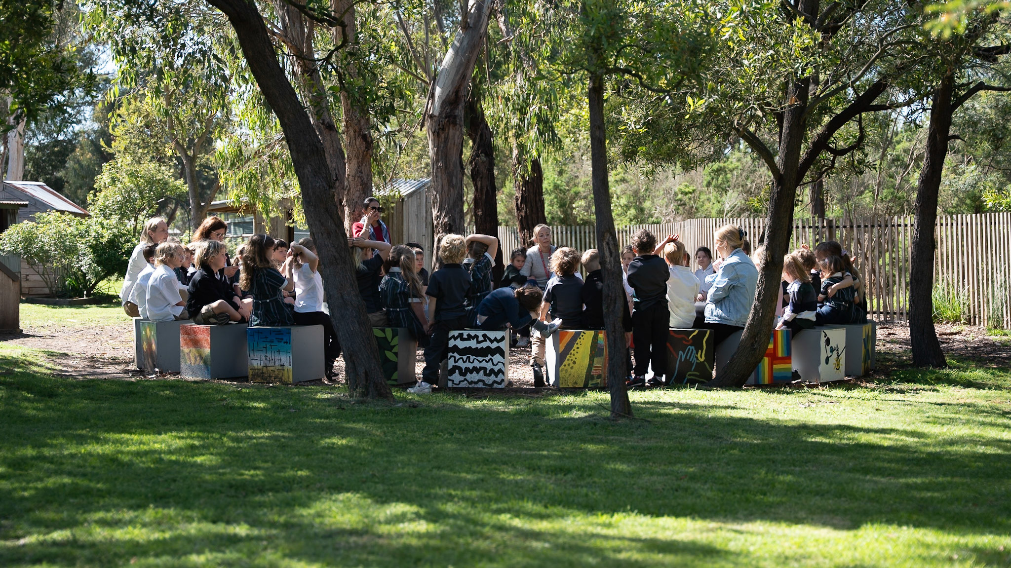Happy children in the beautiful grounds of Woodleigh's Penbank campus