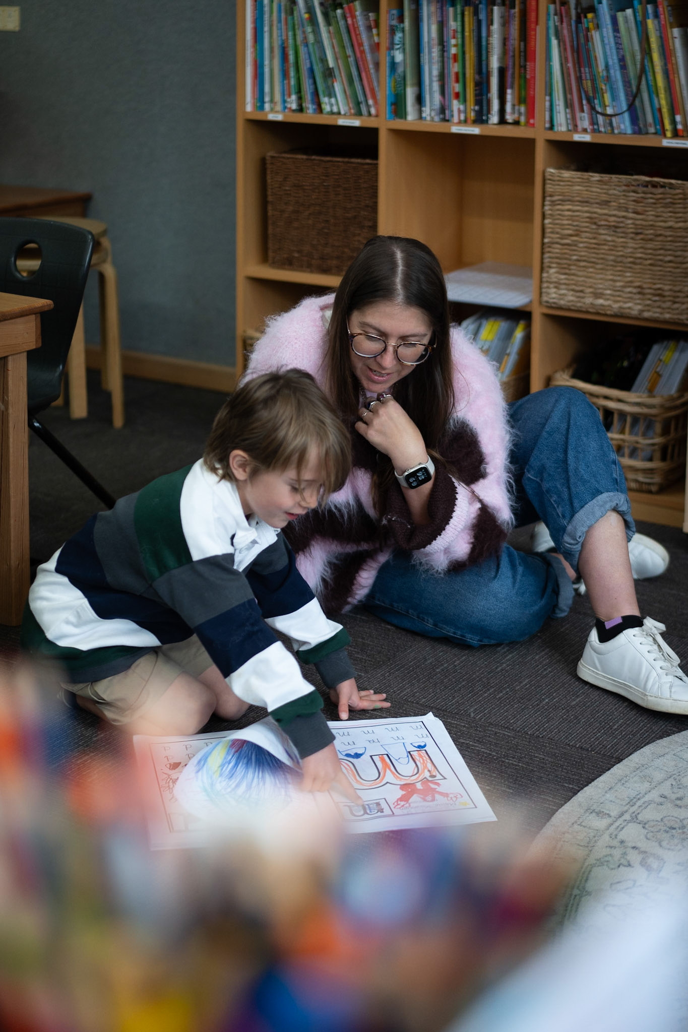Phonics is taught through explicit, targeted foundational skills and seamlessly woven into authentic, transdisciplinary units of inquiry to build both decoding skills and conceptual understanding